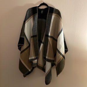 OS multi-colored poncho. Wonderful clothing piece to add to your closet!